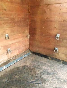 Four-rings-in-stable-wall-to-secure-Slow-Down-Hay-Feeder-for-horses